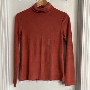 Uniqlo. Small. Heat Tech fleece turtleneck long sleeve.
